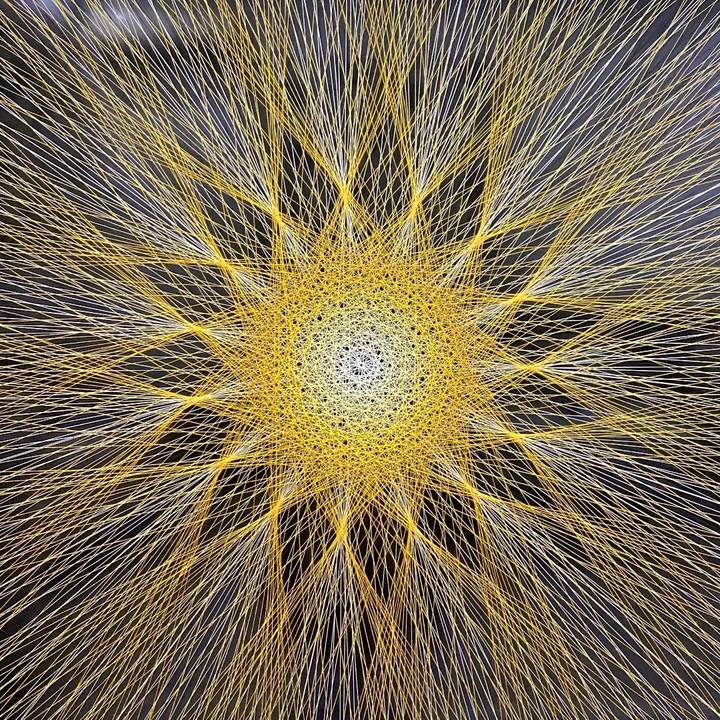 Yellow starburst string art on purple